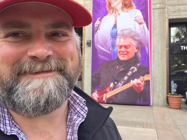 With a Marty Stuart concert poster